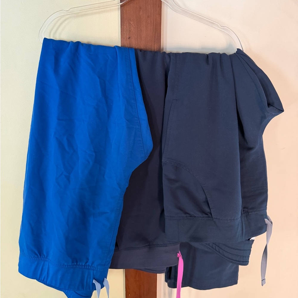 Figs Women's Scrub bottoms in Winning blue, charcoal, and dark Harbor.